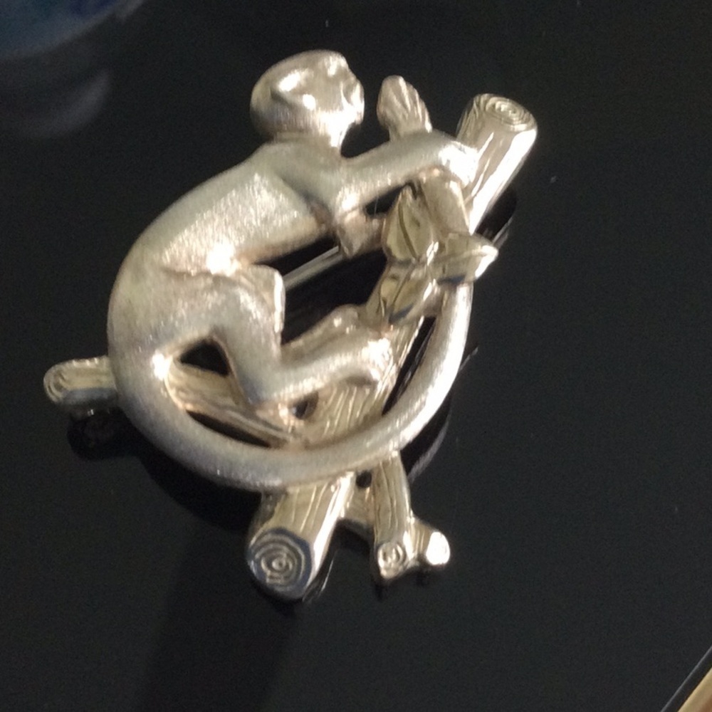 Woman’s Vintage Brooch of a Monkey on a branch made of Sliver
